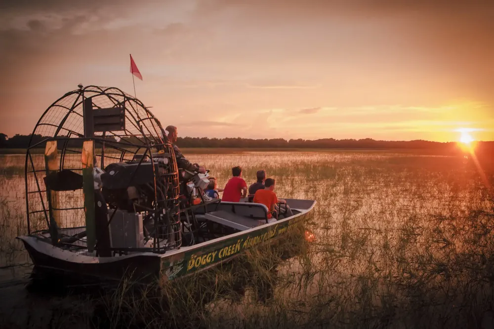 Airboat on the lake at sunset in Kissimmee